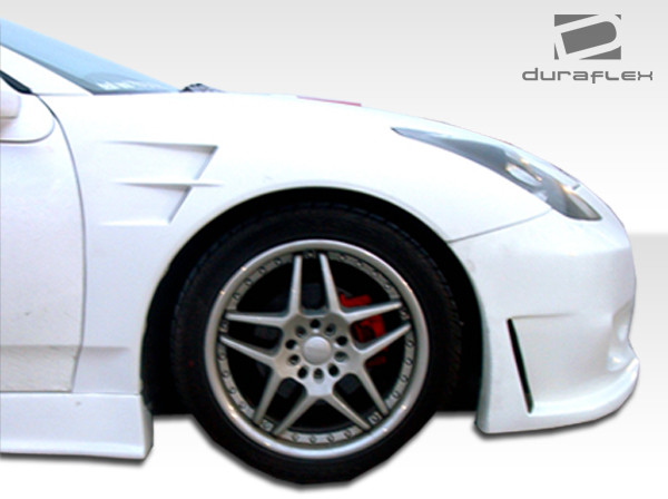 2000-2005 Toyota Celica Duraflex X-2 Fenders - 2 Piece / Vehicle Year Make Model Trim - 2000-2005-Toyota Celica ALL / Product Type - Fender / Style Name -X-2 / Kit Material - FRP (Fiberglass Reinforced Plastics) / Notes -