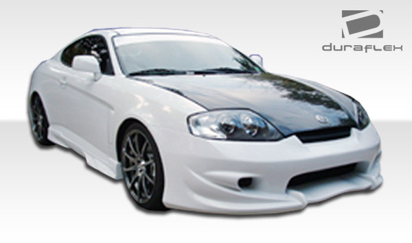 2003-2006 Hyundai Tiburon Duraflex Vader Front Bumper Cover - 1 Piece / Vehicle Year Make Model Trim - 2003-2006-Hyundai Tiburon ALL / Product Type - Front Bumper / Style Name -Vader / Kit Material - FRP (Fiberglass Reinforced Plastics) / Notes -