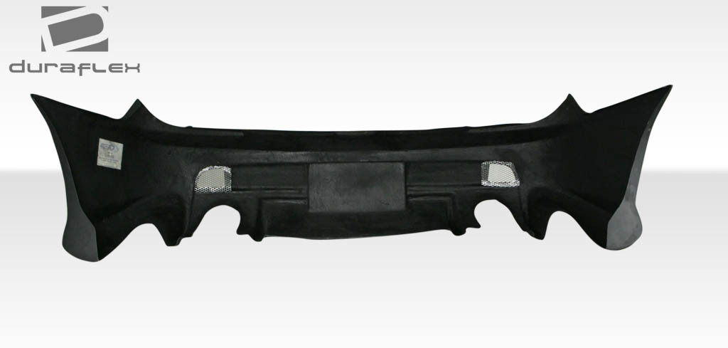 2003-2006 Hyundai Tiburon Duraflex Vader Rear Bumper Cover - 1 Piece / Vehicle Year Make Model Trim - 2003-2006-Hyundai Tiburon ALL / Product Type - Rear Bumper / Style Name -Vader / Kit Material - FRP (Fiberglass Reinforced Plastics) / Notes -