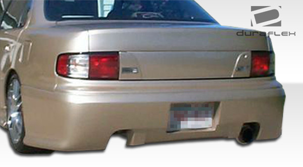 1992-1996 Toyota Camry Duraflex Swift Rear Bumper Cover - 1 Piece / Vehicle Year Make Model Trim - 1992-1996-Toyota Camry ALL / Product Type - Rear Bumper / Style Name -Swift / Kit Material - FRP (Fiberglass Reinforced Plastics) / Notes -