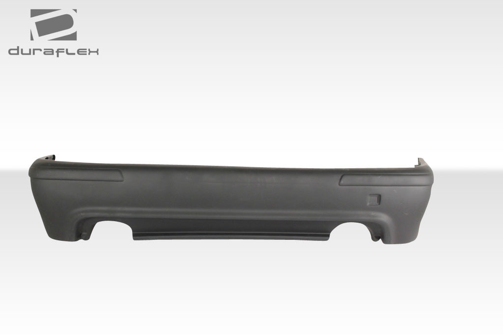 1997-2003 BMW 5 Series E39 4DR Duraflex M5 Look Rear Bumper Cover - 1 Piece / Vehicle Year Make Model Trim - 1997-2003-BMW 5 Series 4DR / Product Type - Rear Bumper / Style Name -M5 Look / Kit Material - FRP (Fiberglass Reinforced Plastics) / Notes - Note: actual m5 style rear bumper has dual exhaust opening.
