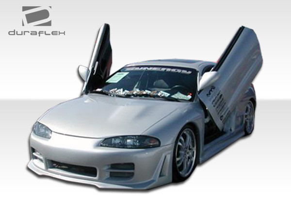 1995-1999 Mitsubishi Eclipse Eagle Talon Duraflex R34 Front Bumper Cover - 1 Piece / Vehicle Year Make Model Trim - 1995-1999-Mitsubishi Eclipse ALL / Product Type - Front Bumper / Style Name -R34 / Kit Material - FRP (Fiberglass Reinforced Plastics) / Notes - Note: front bumper is designed for 97-99 models. 95-96 models will need to modify bumper or use 97-99 headlights in order to fit properly.