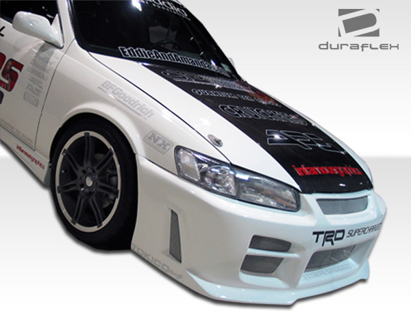1997-2001 Toyota Camry Duraflex R34 Front Bumper Cover - 1 Piece / Vehicle Year Make Model Trim - 1997-2001-Toyota Camry ALL / Product Type - Front Bumper / Style Name -R34 / Kit Material - FRP (Fiberglass Reinforced Plastics) / Notes - Note: 00-01 models need modifications to fit properly