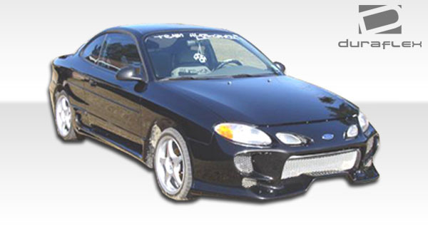 1998-2003 Ford Escort ZX2 Duraflex Vader Side Skirts Rocker Panels - 2 Piece / Vehicle Year Make Model Trim - 1998-2003-Ford Escort 2DR / Product Type - Sideskirts / Style Name -Vader / Kit Material - FRP (Fiberglass Reinforced Plastics) / Notes -