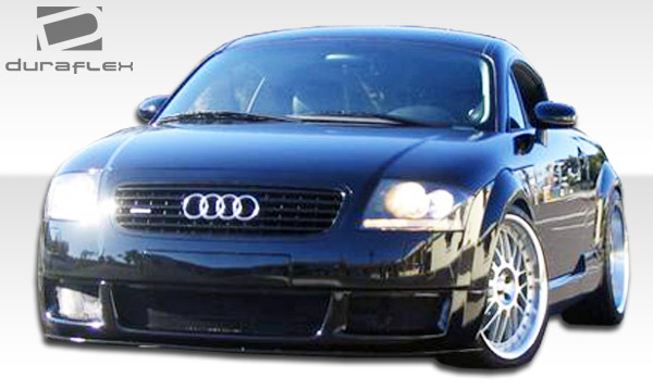 2000-2006 Audi TT 8N Duraflex RS4 Front Lip Under Spoiler Air Dam - 1 Piece / Vehicle Year Make Model Trim - 2000-2006-Audi TT ALL / Product Type - Front Lip/Add On / Style Name -RS4 / Kit Material - FRP (Fiberglass Reinforced Plastics) / Notes -