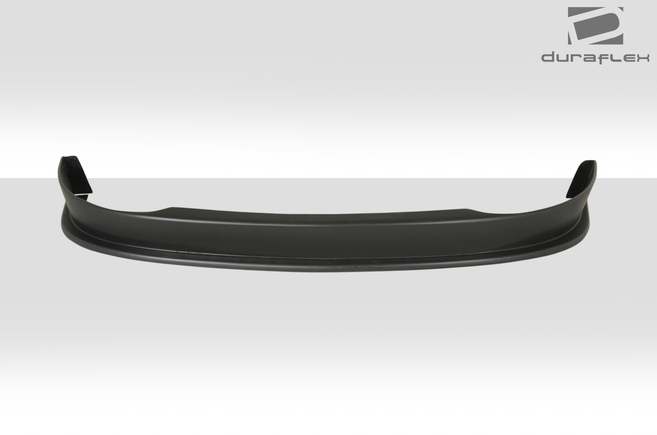 2006-2007 Chevrolet Monte Carlo Duraflex Racer Front Lip Under Spoiler Air Dam - 1 Piece / Vehicle Year Make Model Trim - 2006-2007-Chevrolet Monte Carlo ALL / Product Type - Front Lip/Add On / Style Name -Racer / Kit Material - FRP (Fiberglass Reinforced Plastics) / Notes -
