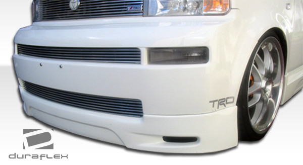 2004-2007 Scion xB Duraflex F-1 Front Lip Under Spoiler Air Dam - 1 Piece / Vehicle Year Make Model Trim - 2004-2007-Scion xB ALL / Product Type - Front Lip/Add On / Style Name -F-1 / Kit Material - FRP (Fiberglass Reinforced Plastics) / Notes -