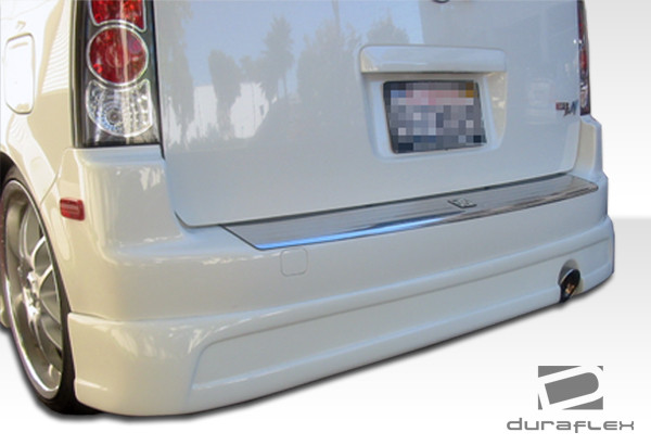 2004-2007 Scion xB Duraflex F-1 Rear Lip Under Spoiler Air Dam - 1 Piece / Vehicle Year Make Model Trim - 2004-2007-Scion xB ALL / Product Type - Rear Lip/Add On / Style Name -F-1 / Kit Material - FRP (Fiberglass Reinforced Plastics) / Notes -
