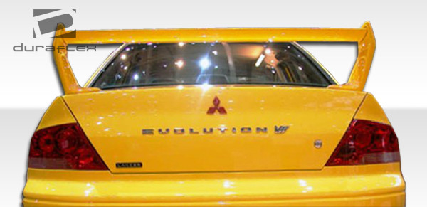 2002-2007 Mitsubishi Lancer 2003-2006 Mitsubishi Lancer Evolution 8 9 Duraflex Evo 7 Wing Trunk Lid Spoiler - 1 Piece / Vehicle Year Make Model Trim - 2002-2007-Mitsubishi Lancer ALL / Product Type - Wing / Style Name -Evo 7 / Kit Material - FRP (Fiberglass Reinforced Plastics) / Notes -