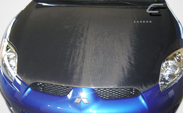 2006-2012 Mitsubishi Eclipse Carbon Creations OEM Look Hood - 1 Piece / Vehicle Year Make Model Trim - 2006-2012-Mitsubishi Eclipse ALL / Product Type - Hood / Style Name -OEM Look / Kit Material - Carbon Fiber / Notes - Note: Hood pins are required.