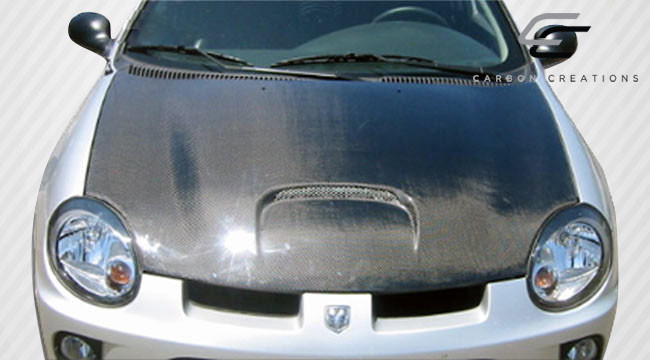 2000-2005 Dodge Neon Carbon Creations SRT Look Hood - 1 Piece / Vehicle Year Make Model Trim - 2000-2005-Dodge Neon ALL / Product Type - Hood / Style Name -SRT Look / Kit Material - Carbon Fiber / Notes - Note: Hood pins are required.