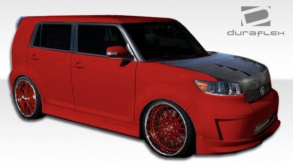 2008-2015 Scion xB Duraflex Racer Front Lip Under Spoiler Air Dam - 1 Piece / Vehicle Year Make Model Trim - 2008-2015-Scion xB ALL / Product Type - Front Lip/Add On / Style Name -Racer / Kit Material - FRP (Fiberglass Reinforced Plastics) / Notes -