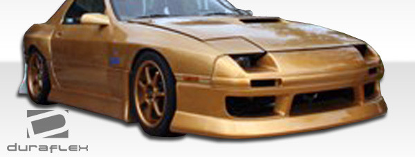 1986-1991 Mazda RX-7 Duraflex B-Sport Front Bumper Cover - 1 Piece / Vehicle Year Make Model Trim - 1986-1991-Mazda RX7 ALL / Product Type - Front Bumper / Style Name -B-Sport / Kit Material - FRP (Fiberglass Reinforced Plastics) / Notes -