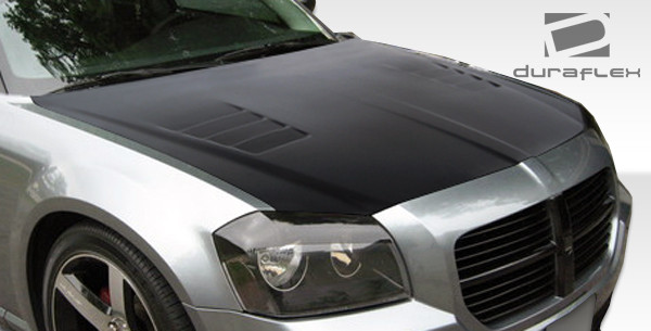 2005-2007 Dodge Magnum Duraflex Executive Hood - 1 Piece / Vehicle Year Make Model Trim - 2005-2007-Dodge Magnum ALL / Product Type - Hood / Style Name -Executive / Kit Material - FRP (Fiberglass Reinforced Plastics) / Notes - Note: Hood pins are required.