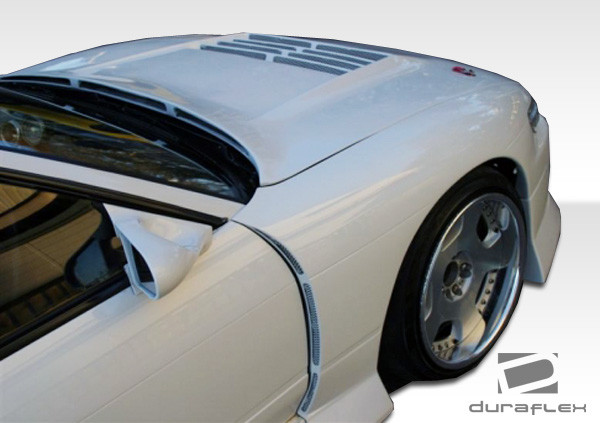 1989-1994 Nissan Silvia S13 Duraflex B-Sport Wide Body Front Fenders - 2 Piece / Vehicle Year Make Model Trim - 1989-1994-Nissan S13 Silvia 2DR / Product Type - Fender / Style Name -B-Sport / Kit Material - FRP (Fiberglass Reinforced Plastics) / Notes - Note: must be used in conjunction with complete wide body kit