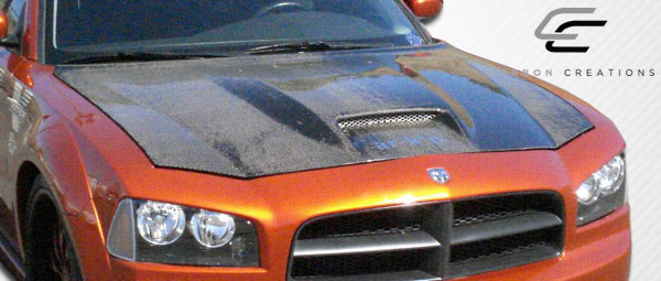 2006-2010 Dodge Charger Carbon Creations SRT Look Hood - 1 Piece / Vehicle Year Make Model Trim - 2006-2010-Dodge Charger ALL / Product Type - Hood / Style Name -SRT Look / Kit Material - Carbon Fiber / Notes - Note: Hood pins are required.