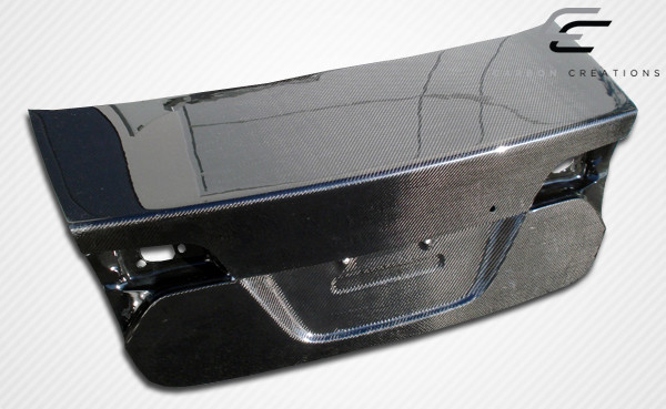 2006-2011 Honda Civic 4DR Carbon Creations OEM Look Trunk - 1 Piece / Vehicle Year Make Model Trim - 2006-2011-Honda Civic 4DR / Product Type - Trunk/Hatch / Style Name -OEM Look / Kit Material - Carbon Fiber / Notes - Note: some trunks/hatches may have springs or shocks that must be removed for proper fitment.