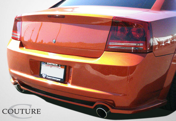 2006-2010 Dodge Charger Couture Polyurethane Luxe Wide Body Rear Bumper Cover - 1 Piece / Vehicle Year Make Model Trim - 2006-2010-Dodge Charger ALL / Product Type - Rear Bumper / Style Name -Luxe / Kit Material - Polyurethane / Notes - Note: must be used in conjunction with complete wide body kit