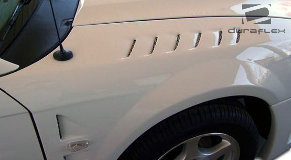 1999-2004 Ford Mustang Duraflex Z3000 Fender - 2 Piece / Vehicle Year Make Model Trim - 1999-2004-Ford Mustang ALL / Product Type - Fender / Style Name -Z3000 / Kit Material - FRP (Fiberglass Reinforced Plastics) / Notes -