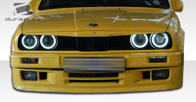 1988-1991 BMW 3 Series E30 2DR Duraflex M-Tech Body Kit - 4 Piece - Includes M-Tech Front Bumper Cover (105044) M-Tech Rear Bumper Cover (105047) M-Tech Side Skirts Rocker Panels (105046) / Vehicle Year Make Model Trim - 1988-1991-BMW 3 Series 2DR / Product Type - Kit / Style Name -M-Tech / Kit Material - FRP (Fiberglass Reinforced Plastics) / Notes -