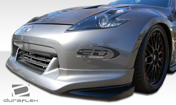 2009-2012 Nissan 370Z Z34 Duraflex N-1 Front Lip Under Spoiler Air Dam - 1 Piece / Vehicle Year Make Model Trim - 2009-2012-Nissan 370Z ALL / Product Type - Front Lip/Add On / Style Name -N-1 / Kit Material - FRP (Fiberglass Reinforced Plastics) / Notes -