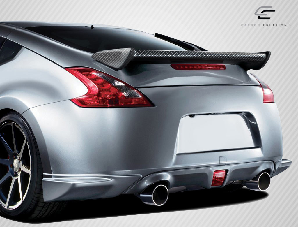 2009-2020 Nissan 370Z Z34 Coupe Carbon Creations N-1 Wing Trunk Lid Spoiler - 1 Piece / Vehicle Year Make Model Trim - 2009-2020-Nissan 370Z 2DR / Product Type - Wing / Style Name -N-1 / Kit Material - Carbon Fiber / Notes - Note: this will not fit convertible models