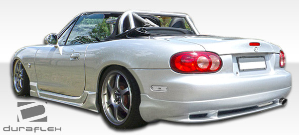 1999-2005 Mazda Miata Duraflex Wizdom Side Skirts Rocker Panels - 2 Piece / Vehicle Year Make Model Trim - 1999-2005-Mazda Miata ALL / Product Type - Sideskirts / Style Name -Wizdom / Kit Material - FRP (Fiberglass Reinforced Plastics) / Notes -