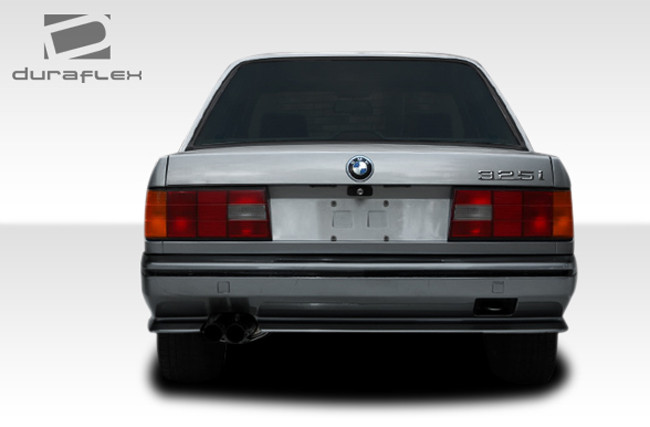 1984-1991 BMW 3 Series E30 2DR 4DR Duraflex Evo Look Rear Bumper Cover - 1 Piece / Vehicle Year Make Model Trim - 1984-1991-BMW 3 Series ALL / Product Type - Rear Bumper / Style Name -Evo Look / Kit Material - FRP (Fiberglass Reinforced Plastics) / Notes -