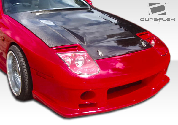 1986-1991 Mazda RX-7 Duraflex R-Design Front Bumper Cover Conversion - 1 Piece / Vehicle Year Make Model Trim - 1986-1991-Mazda RX7 ALL / Product Type - Front Bumper / Style Name -R-Design / Kit Material - FRP (Fiberglass Reinforced Plastics) / Notes -