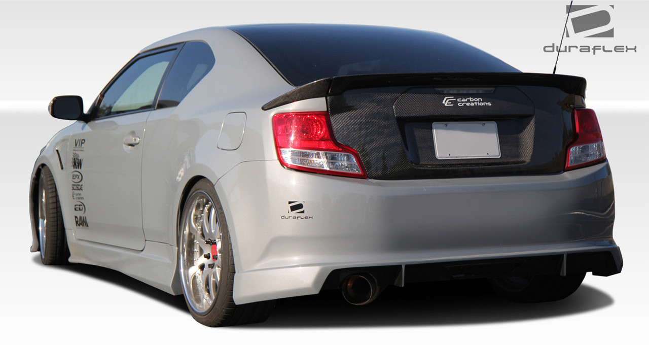 2011-2013 Scion tC Duraflex GT Concept Rear Bumper Cover - 1 Piece / Vehicle Year Make Model Trim - 2011-2013-Scion TC ALL / Product Type - Rear Bumper / Style Name -GT Concept / Kit Material - FRP (Fiberglass Reinforced Plastics) / Notes -