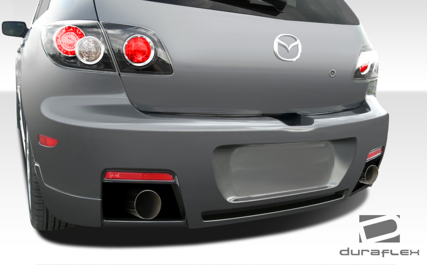 2004-2009 Mazda 3 HB Duraflex X-Sport Rear Bumper Cover - 1 Piece / Vehicle Year Make Model Trim - 2004-2009-Mazda Mazda 3 HB / Product Type - Rear Bumper / Style Name -X-Sport / Kit Material - FRP (Fiberglass Reinforced Plastics) / Notes - Note: All Overstock products are sold on a first come, first serve basis. Overstock products are sold as is, and all sales are final. Overstock products may not be returned or exchanged.