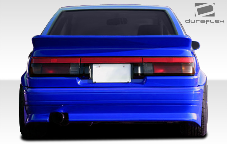 1984-1987 Toyota Corolla 2DR / HB Duraflex RF Design Rear Bumper Cover - 1 Piece / Vehicle Year Make Model Trim - 1984-1987-Toyota Corolla 2DR / Product Type - Rear Bumper / Style Name -RF Design / Kit Material - FRP (Fiberglass Reinforced Plastics) / Notes -