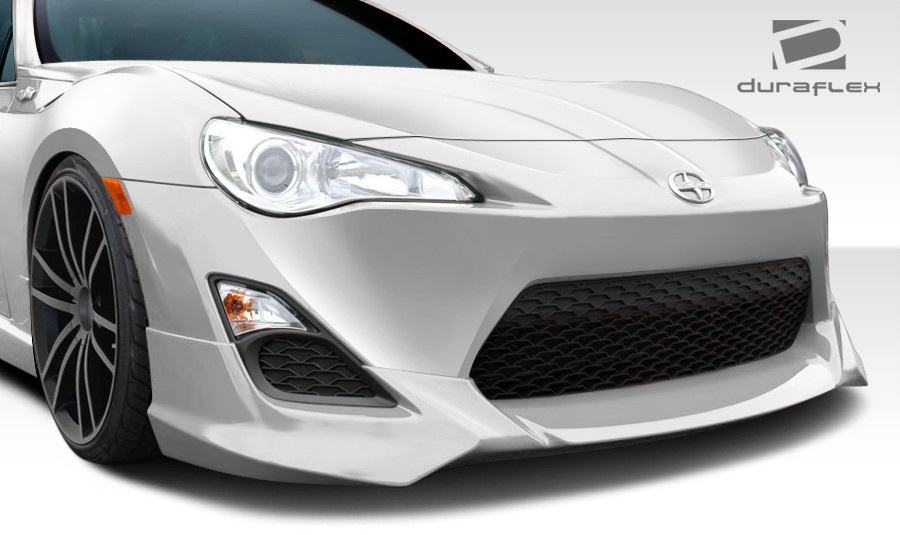 2013-2016 Scion FR-S Duraflex X-5 Body Kit - 5 Piece - Includes X-5 Front Lip Under Spoiler Air Dam (108487) X-5 Side Skirts Rocker Panels (108490) X-5 Rear Add On Bumper Spat Extensions (108488) / Vehicle Year Make Model Trim - 2013-2016-Scion FRS ALL / Product Type - Kit / Style Name -X-5 / Kit Material - FRP (Fiberglass Reinforced Plastics) / Notes -