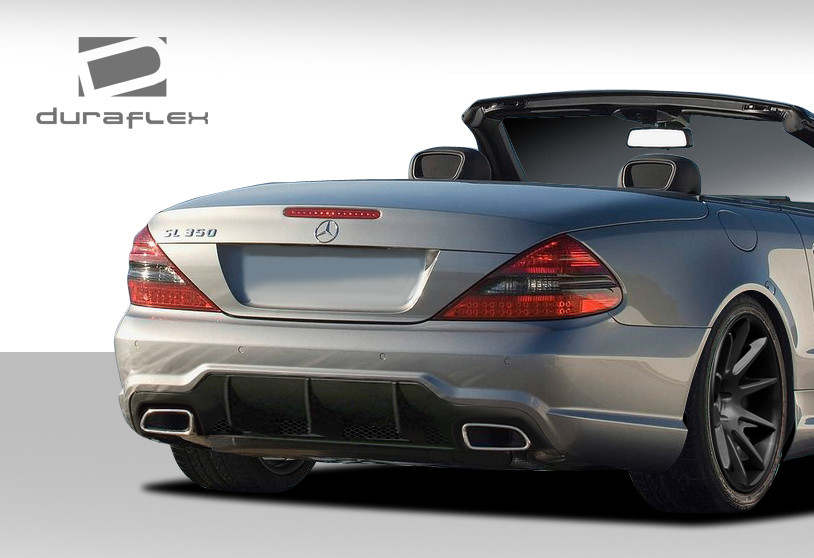 2003-2012 Mercedes SL Class R230 Duraflex SL65 Look Rear Bumper Cover - 1 Piece / Vehicle Year Make Model Trim - 2003-2012-Mercedes SL - Mercedes ALL / Product Type - Rear Bumper / Style Name -SL65 Look / Kit Material - FRP (Fiberglass Reinforced Plastics) / Notes -