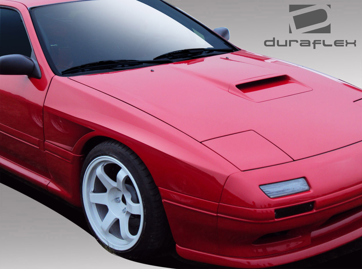 1986-1991 Mazda RX-7 Duraflex FK Sport 20mm Front Fenders - 2 Piece / Vehicle Year Make Model Trim - 1986-1991-Mazda RX7 ALL / Product Type - Fender / Style Name -FK Sport / Kit Material - FRP (Fiberglass Reinforced Plastics) / Notes -