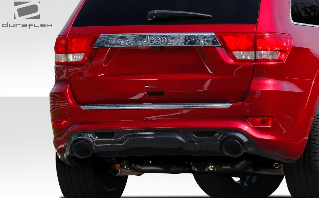 2011-2015 Jeep Grand Cherokee Duraflex SRT Look Rear Bumper Cover - 1 Piece / Vehicle Year Make Model Trim - 2011-2015-Jeep Grand Cherokee ALL / Product Type - Rear Bumper / Style Name -SRT Look / Kit Material - FRP (Fiberglass Reinforced Plastics) / Notes -