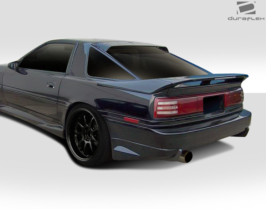 1986-1992 Toyota Supra Duraflex AB-F Rear Add Ons Spat Extensions - 2 Piece / Vehicle Year Make Model Trim - 1986-1992-Toyota Supra ALL / Product Type - Rear Lip/Add On / Style Name -AB-F / Kit Material - FRP (Fiberglass Reinforced Plastics) / Notes -