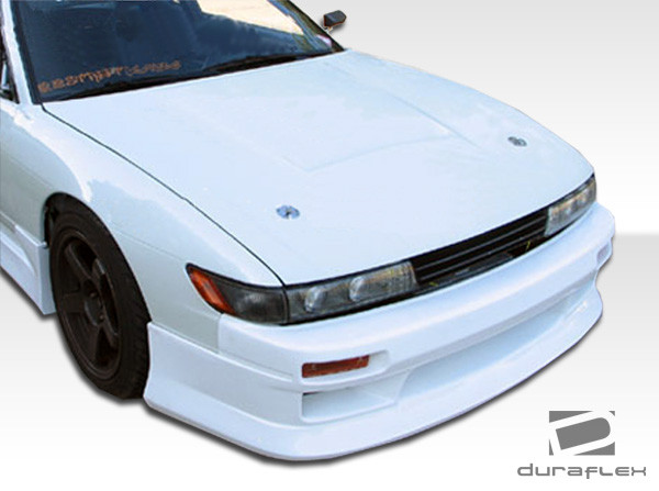 1989-1994 Nissan 240SX S13 Duraflex Silvia S13 Conversion V-Speed Kit - 4 Piece - Includes S13 Conversion V-Speed Front Bumper Cover (102204) S13 Conversion M-1 Sport Fenders (100877) S13 Conversion M-1 Sport Hood (102203) / Vehicle Year Make Model Trim - 1989-1994-Nissan 240SX 2DR / Product Type - Kit / Style Name -V-Speed / Kit Material - FRP (Fiberglass Reinforced Plastics) / Notes -