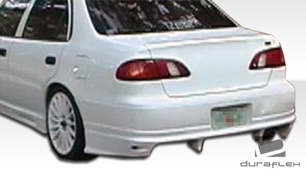 1998-2000 Toyota Corolla Duraflex Bomber Body Kit - 4 Piece - Includes Bomber Front Bumper Cover (102031) Bomber Rear Bumper Cover (102032) Bomber Side Skirts Rocker Panels (102033) / Vehicle Year Make Model Trim - 1998-2000-Toyota Corolla ALL / Product Type - Kit / Style Name -Bomber / Kit Material - FRP (Fiberglass Reinforced Plastics) / Notes -
