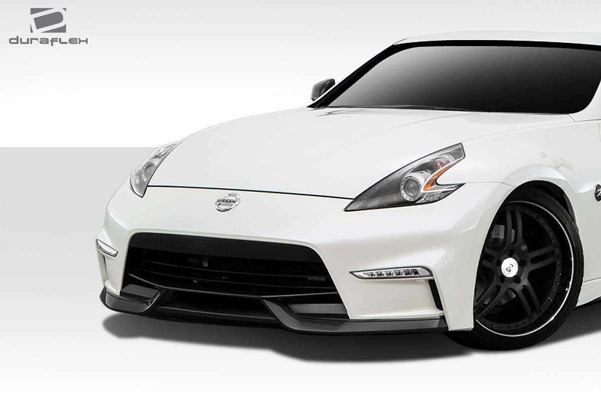 2009-2020 Nissan 370Z Z34 Duraflex N-3 Front Bumper Cover - 1 Piece / Vehicle Year Make Model Trim - 2009-2020-Nissan 370Z ALL / Product Type - Front Bumper / Style Name -N-3 / Kit Material - FRP (Fiberglass Reinforced Plastics) / Notes - Note: The lights pictured in the bumper are oem nismo lights. The bumper will need to be modified in order for the lights to be used