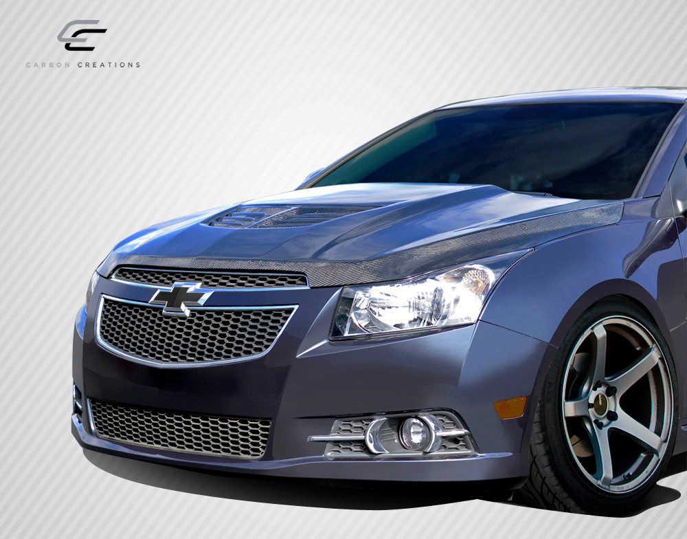 2011-2015 Chevrolet Cruze Carbon Creations Stingray Z Hood- 1 Piece / Vehicle Year Make Model Trim - 2011-2015-Chevrolet Cruze ALL / Product Type - Hood / Style Name -Stingray Z / Kit Material - Carbon Fiber / Notes - Note: Hood pins are required.