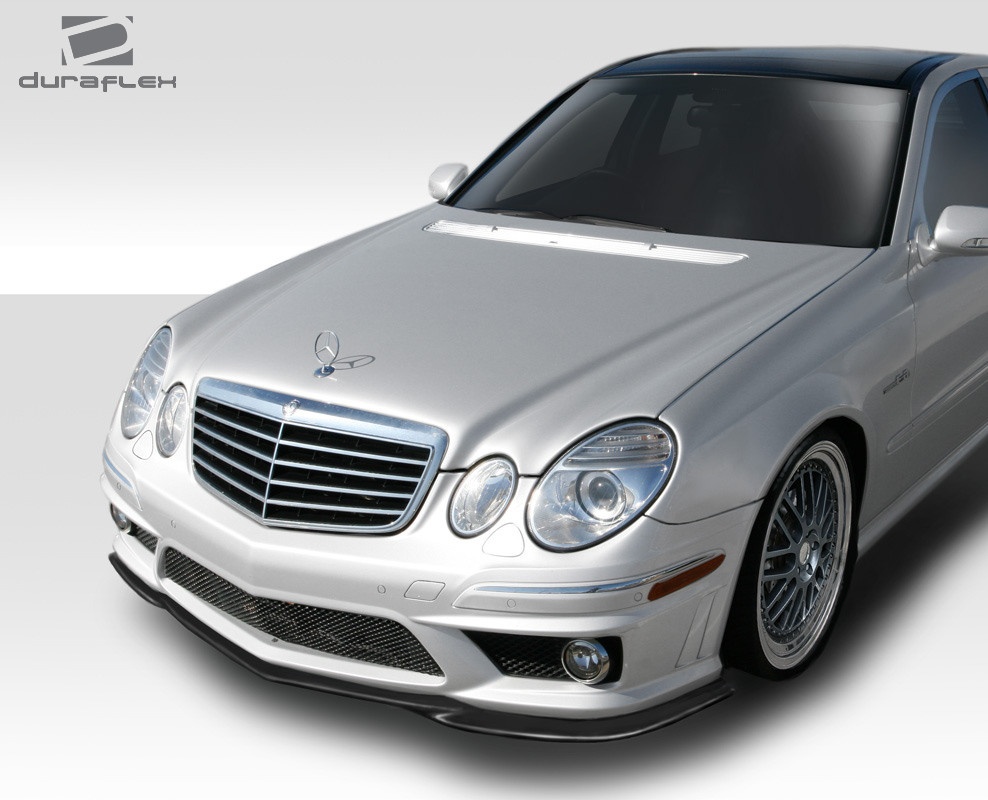 2007-2009 Mercedes E63 W211 Duraflex L Sport Front Lip Spoiler - 1 Piece / Vehicle Year Make Model Trim - 2007-2009-Mercedes E Class ALL / Product Type - Front Lip/Add On / Style Name -L Sport / Kit Material - FRP (Fiberglass Reinforced Plastics) / Notes - Will only fit E63 Front Bumper