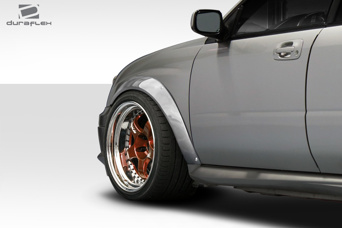2004-2005 Subaru Impreza WRX STI Duraflex Rally Front Fender Flares - 4 Piece / Vehicle Year Make Model Trim - 2004-2005-Subaru Impreza ALL / Product Type - Fender Flare / Style Name -Rally / Kit Material - FRP (Fiberglass Reinforced Plastics) / Notes -