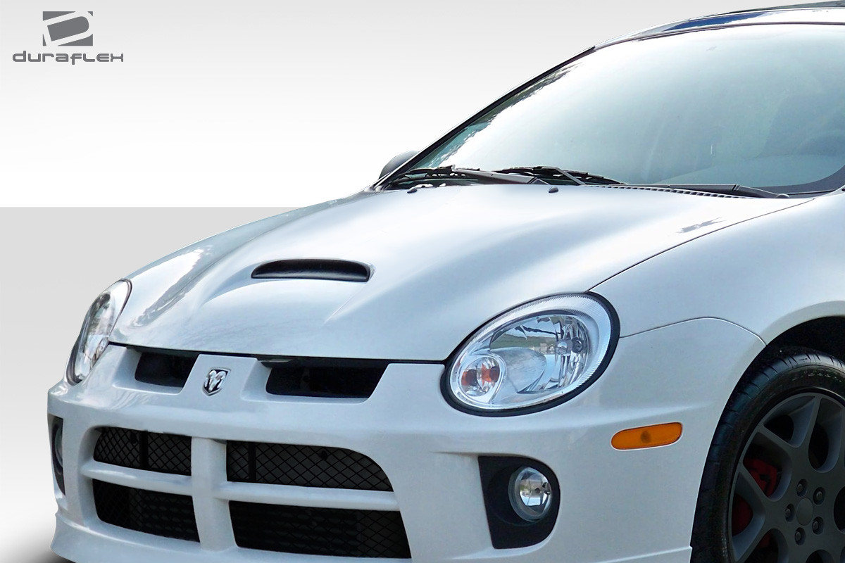 2000-2005 Dodge Neon Duraflex SRT Look Hood - 1 Piece / Vehicle Year Make Model Trim - 2000-2005-Dodge Neon ALL / Product Type - Hood / Style Name -SRT Look / Kit Material - FRP (Fiberglass Reinforced Plastics) / Notes - Note: Hood pins are required.