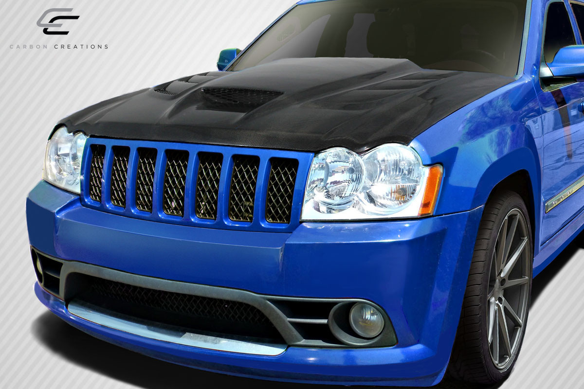 2005-2010 Jeep Grand Cherokee Carbon Creations DriTech Viper Look Hood - 1 Piece / Vehicle Year Make Model Trim - 2005-2010-Jeep Grand Cherokee ALL / Product Type - Hood / Style Name -Viper Look / Kit Material - Carbon Fiber / Notes - Note: Hood pins are required.
