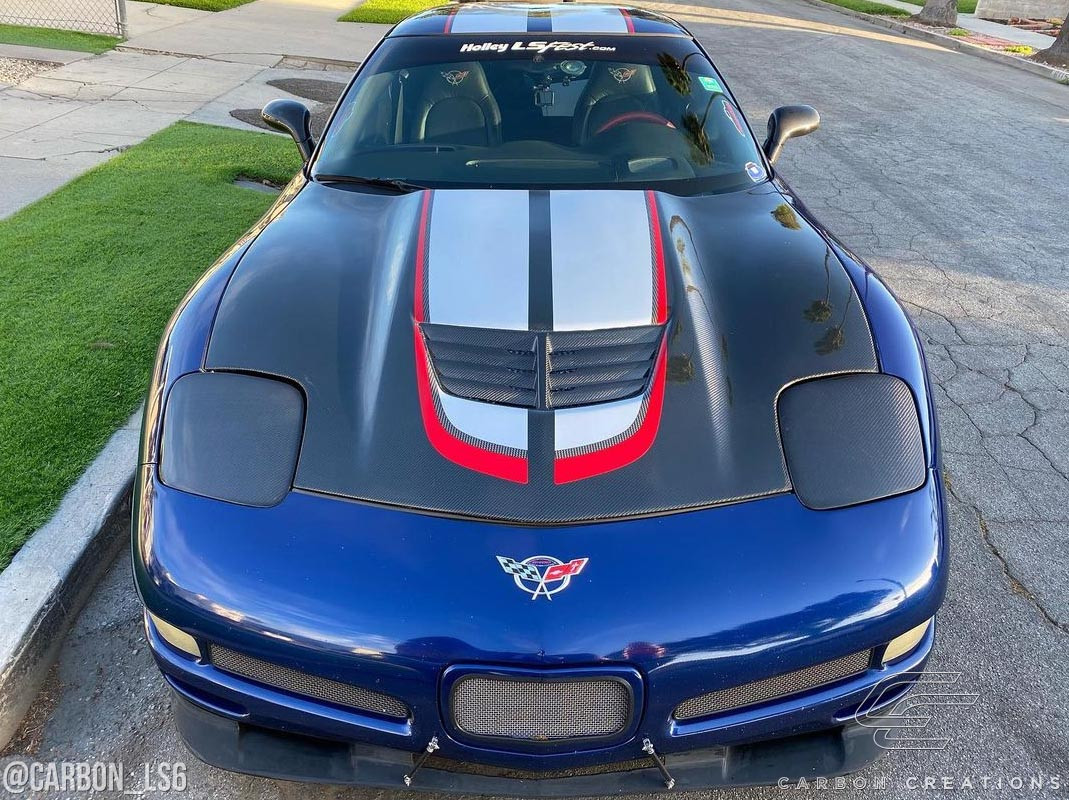 1997-2004 Chevrolet Corvette C5 Carbon Creations DriTech Stingray Z Hood- 1 Piece / Vehicle Year Make Model Trim - 1997-2004-Chevrolet Corvette ALL / Product Type - Hood / Style Name -Stingray Z / Kit Material - Carbon Fiber / Notes - Note: Hood pins are required.