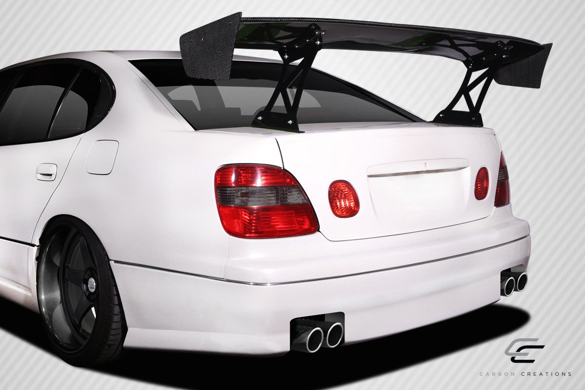 Universal 70" Carbon Creations DriTech VRX V1 Short Wing Complete Kit - 9 Piece - Includes VRX Air Foil Blade (113239) VRX Wing Stands (113242) VRX Wing V1 End Caps (113245) VRX Hardware Kit (115111) / Vehicle Year Make Model Trim - --  ALL / Product Type - Wing / Style Name -\Universal VRX / Kit Material - Carbon Fiber / Notes -