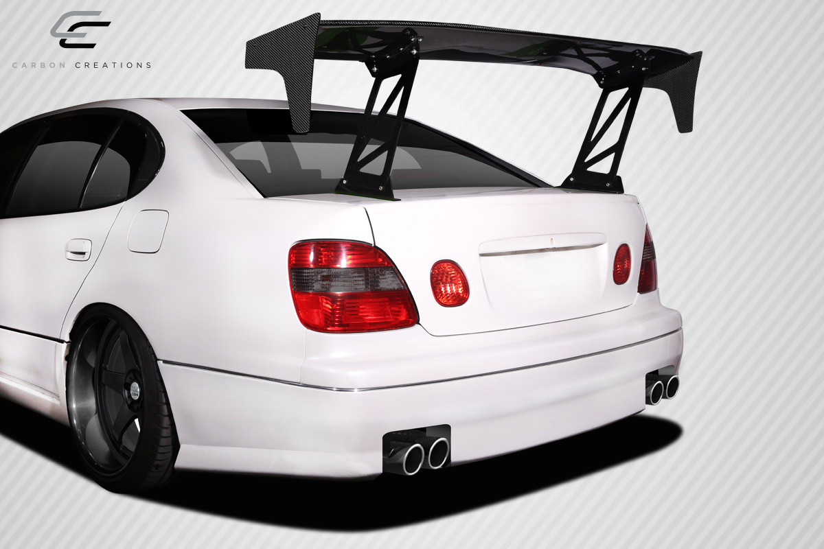 Universal 70" Carbon Creations DriTech VRX V2 Short Wing Complete Kit - 9 Piece - Includes VRX Air Foil Blade (113239) VRX Wing Stands (113243) VRX Wing V2 End Caps (113247) VRX Hardware Kit (115111) / Vehicle Year Make Model Trim - --  ALL / Product Type - Wing / Style Name -\Universal VRX / Kit Material - Carbon Fiber / Notes -