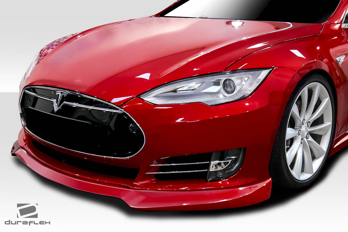 2012-2016 Tesla Model S Duraflex UTech Front Lip Spoiler - 1 Piece / Vehicle Year Make Model Trim - 2012-2016-Tesla Model S ALL / Product Type - Front Lip/Add On / Style Name -Utech / Kit Material - FRP (Fiberglass Reinforced Plastics) / Notes -