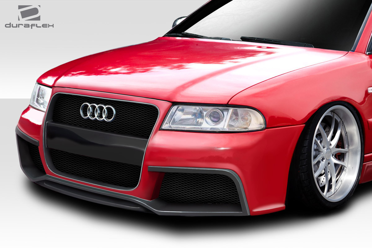 1996-2001 Audi A4 S4 B5 Duraflex Version 1 Front Bumper - 1 Piece / Vehicle Year Make Model Trim - 1996-2001-Audi A4 ALL / Product Type - Front Bumper / Style Name -Version 1 / Kit Material - FRP (Fiberglass Reinforced Plastics) / Notes - Note: hood needs to be cut in order to install front bumper